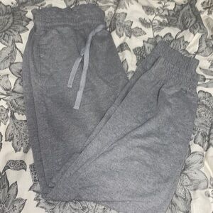 Grey Sweatpants. Frilled Top.